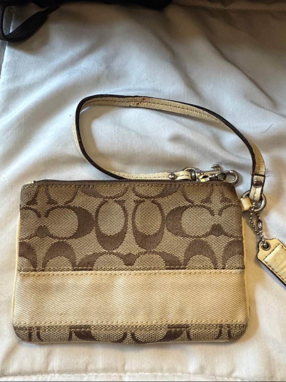 Small Beige and Brown Coach Signature Wristlet